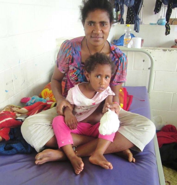 Baby Avila with mother Elizabeth in the surgical ward of Mt Hagen Hospital after the surgery.