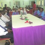 The graduating students are seated before the presentation of their certificates.