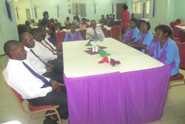 The graduating students are seated before the presentation of their certificates.
