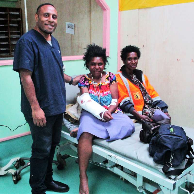 Emergency Physician, Dr John Junior McKup checking a patient who had just been treated at the emergency unit before admitting her to the ward for further observation and treatment.
