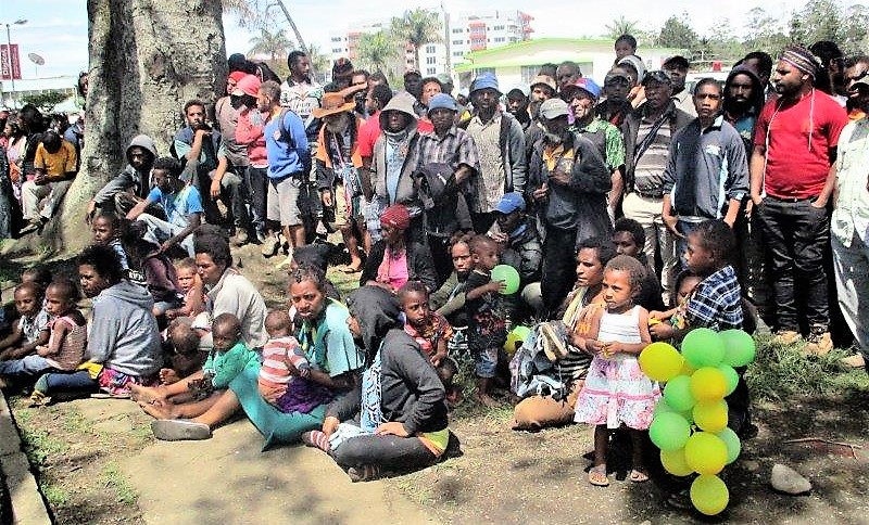 The public listening to speeches.