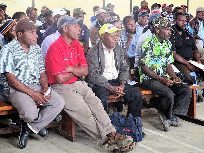 The participants of the three social mobilisation groups listening to members of the health promotion team doing their presentations on polio.