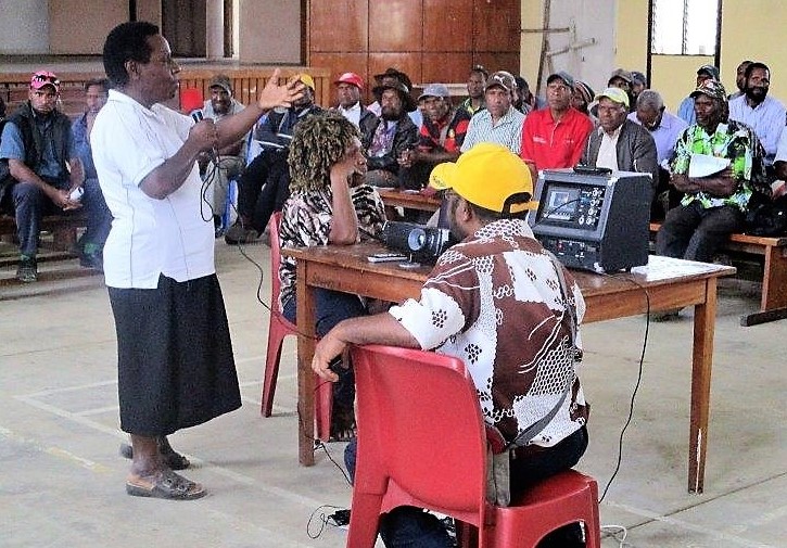 The participants of the three social mobilisation groups listening to members of the health promotion team doing their presentations on polio.
