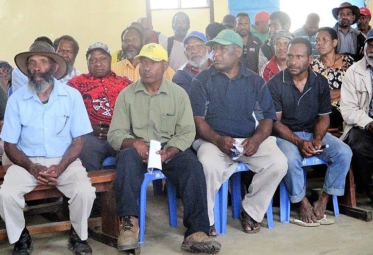 The participants of the three social mobilisation groups listening to members of the health promotion team doing their presentations on polio.