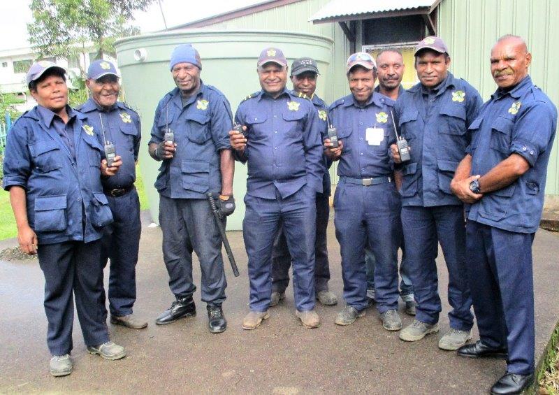Some of the security guards displaying the new radios.