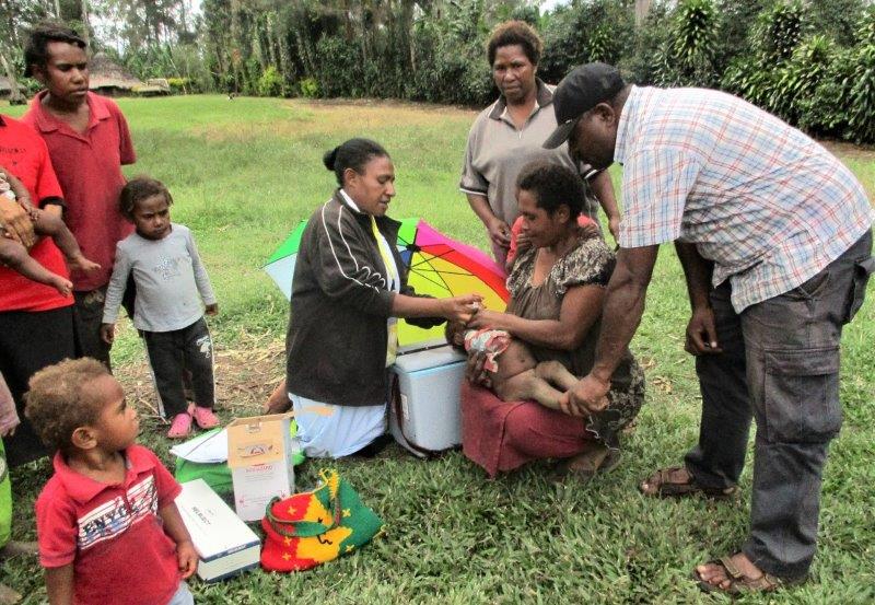 Staff of the WHPHA vaccinating children against polio at various locations in the province.