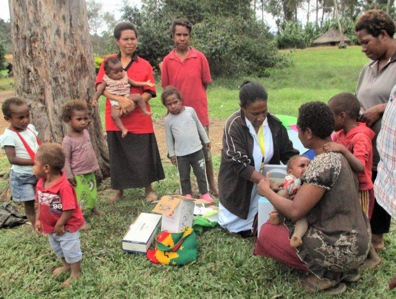 Staff of the WHPHA vaccinating children against polio at various locations in the province.