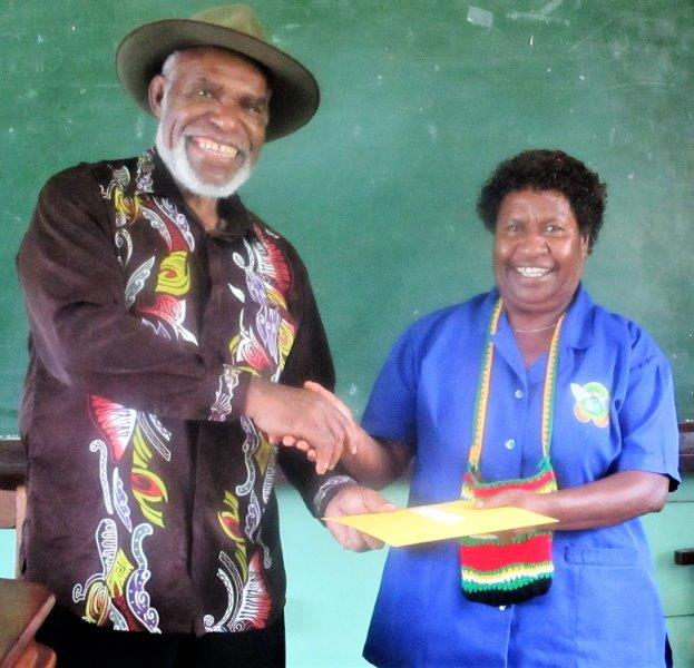 Long-serving employees receiving their certificates of recognition from the Deputy Chairman, Mr Michael Pundia.