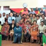 Staff of the WHPHA pose for a picture with their CEO, Mr David Vorst (centre) and their trainers.