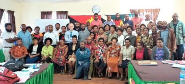 Staff of the WHPHA pose for a picture with their CEO, Mr David Vorst (centre) and their trainers.