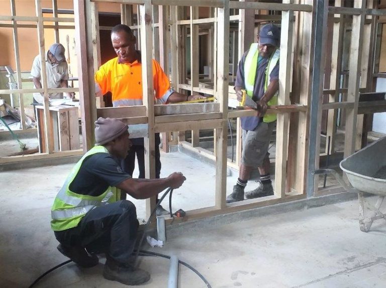 Employees of Kiwa Builders working on the new lab.