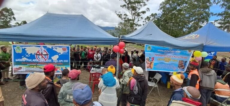 Crowds of people gather at Pope’s Oval during the Awareness Day event.