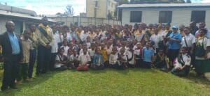 Pastors, Elders and Mothers from the Kelua 2 SDA Church gather for a group photo in front of the hospital Theatre unit