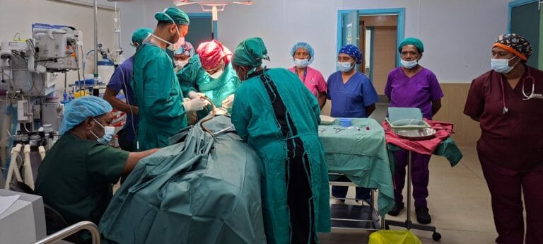 Surgery team inside the operating theatre, Mt Hagen Hospital