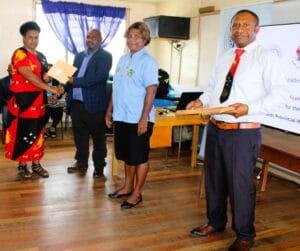 WHPHA Staff, Ms. Paula John receives her certificate