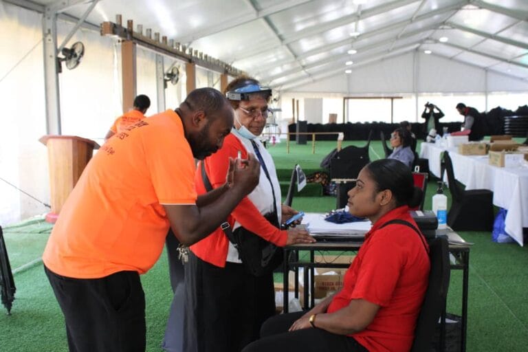 Dr Wahamu engages with the staff of Sir Mara Haus