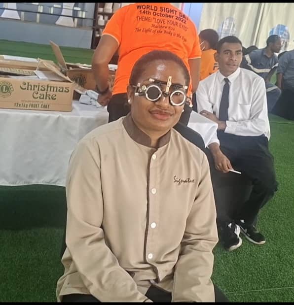 A staff member of Sir Mara Haus undergoes an eye test