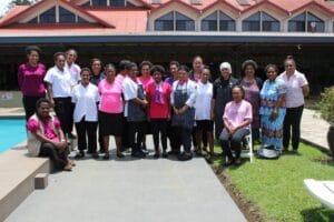 Highlander Hotel staff and Team WHPHA pose for a group photo after the Breast Cancer Awareness session