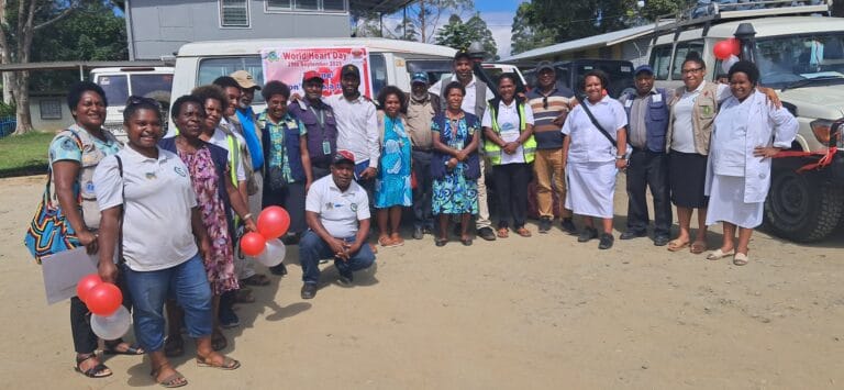 WHPHA staff gather for a team photo before heading out to raise awareness and deliver essential health services to the people in Mt Hagen City