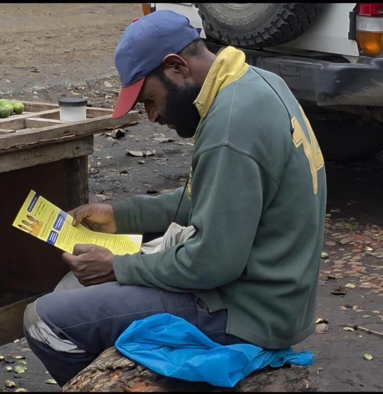 Youths reading the brochures to get more information on cervical cancer