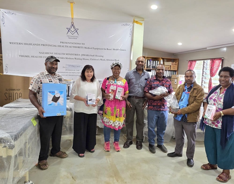 L-R: Mul Baiyer District Health Manager Mr. Francis Pena, WHPHA Acting CEO Ms. Jane Holden, two Masonic Lodge representatives, Deputy Director Curative Health Services Dr. Dat, Dei District Health Manager Mr. Albert Duu, and Stores Manager Ms. Ann Nori proudly pose together during the official handover of vital medical equipment.