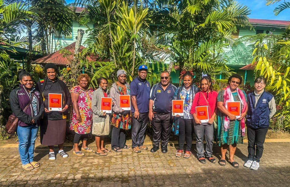 Participants of the Cervical Cancer Workshop pose for a group photo with facilitator Josephine Gabuzzi (third from left), WHPHA CEO Dr. Jonah Kurubi, Cervical Cancer Project Manager Dr. Paulus Ripa, and the WHO representative (first from right).