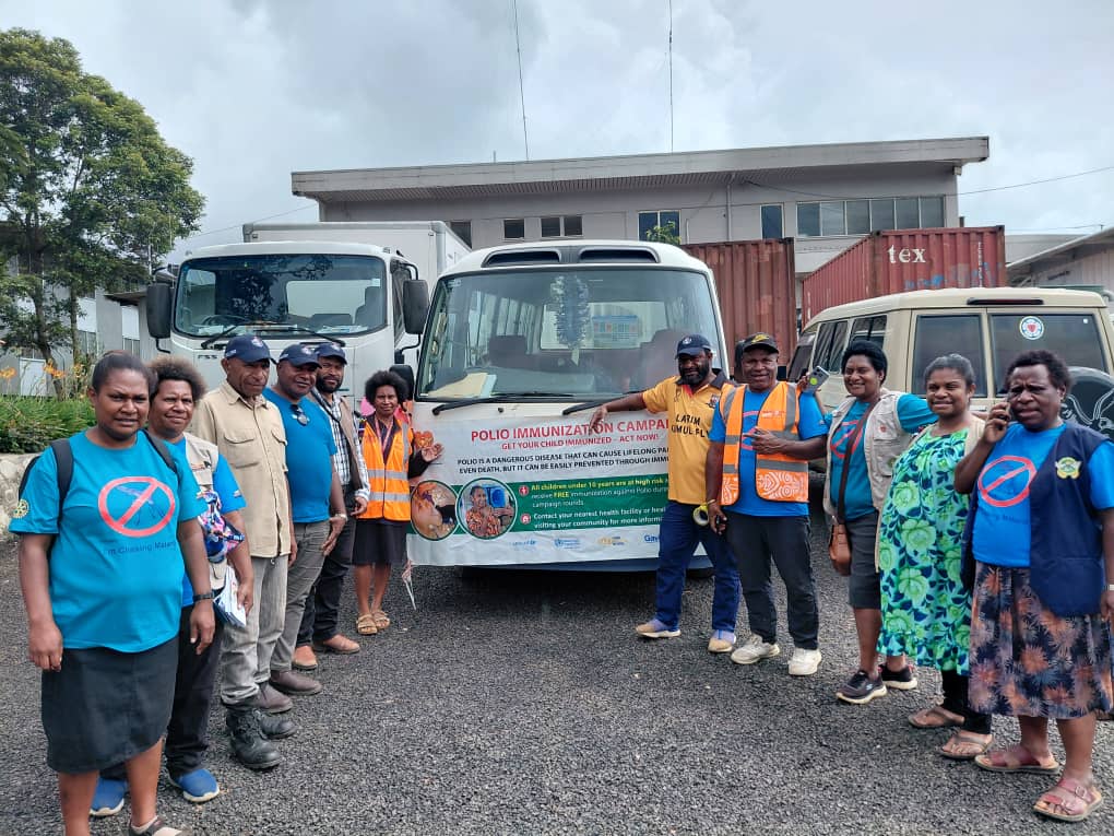The WHPHA Public Health team gathers for a group photo before heading into town to mark World Malaria Day and World Immunization Week.