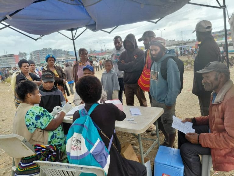 WHPHA team engage with the public in Mt Hagen during awareness and health activities.