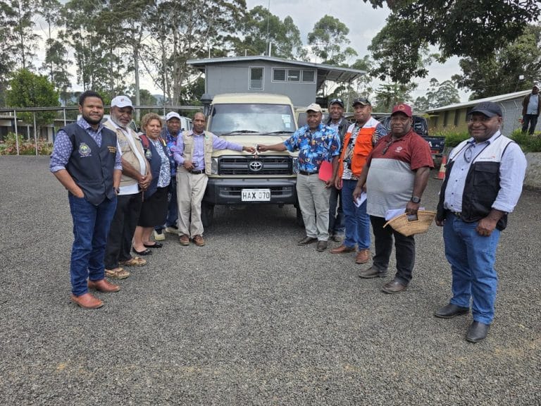 Group photo of WHPHA staff and World Vision Staff during the Handover of the vehicle.